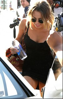 Dress Upskirt Pics miley cyrus sexy short black dress upskirt